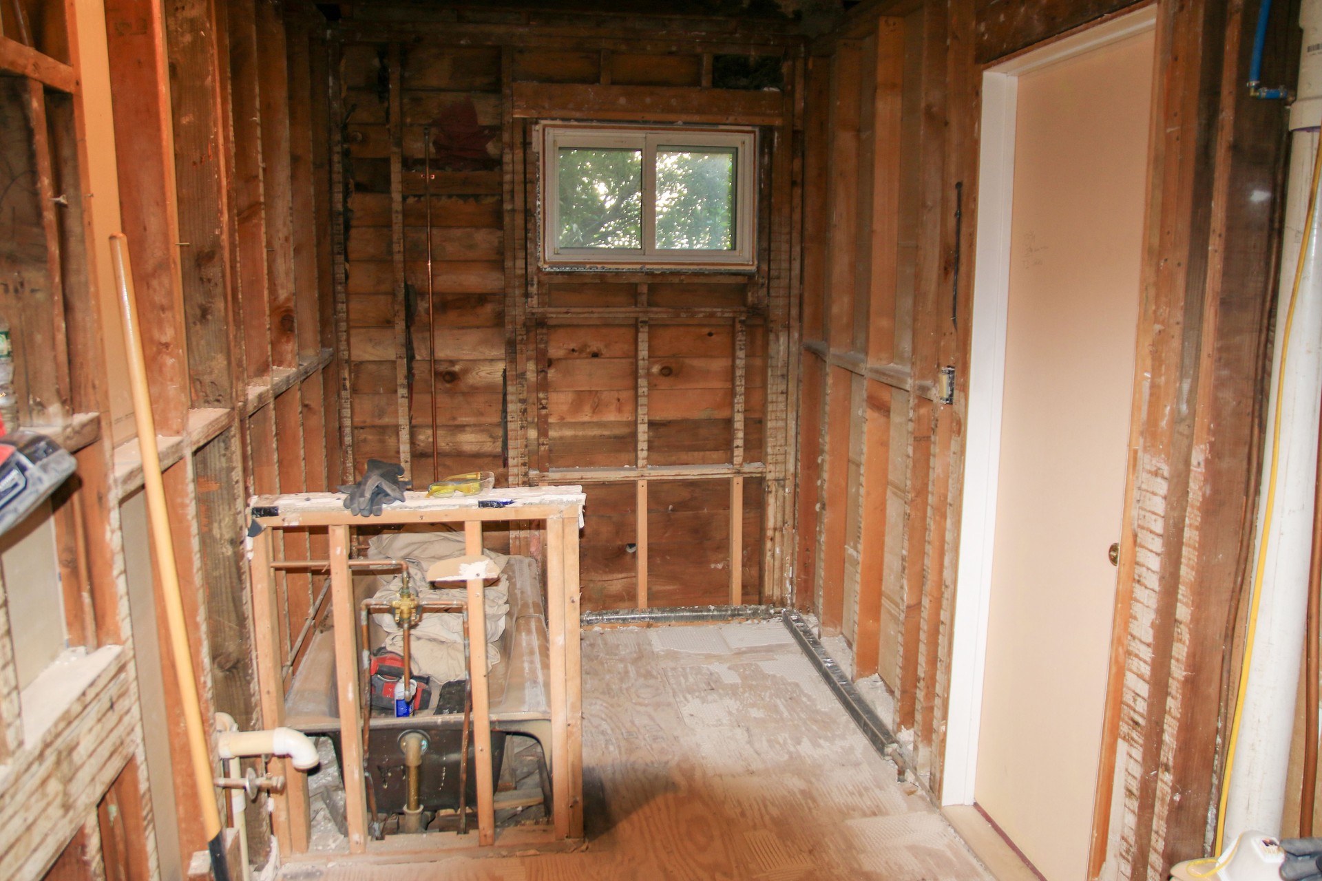 Renovation Project in Partially Stripped Interior by Window